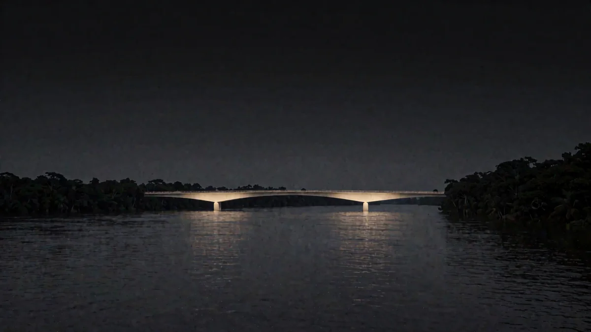 Un río ancho amazónico con un puente moderno iluminado con luz cálida en hora azul